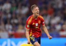 MUNICH, GERMANY – JULY 09: Dani Olmo of Spain celebrates his team’s second goal, an own goal scored by Jules Kounde of France (not pictured) during the UEFA EURO 2024 Semi-Final match between Spain and France at Munich Football Arena on July 09, 2024 in Munich, Germany. (Photo by Boris Streubel – UEFA/UEFA via Getty Images)