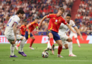 MUNICH, GERMANY – JULY 09: Dani Olmo of Spain controls the ball whilst under pressure from Theo Hernandez and William Saliba of France during the UEFA EURO 2024 Semi-Final match between Spain and France at Munich Football Arena on July 09, 2024 in Munich, Germany. (Photo by Boris Streubel – UEFA/UEFA via Getty Images)